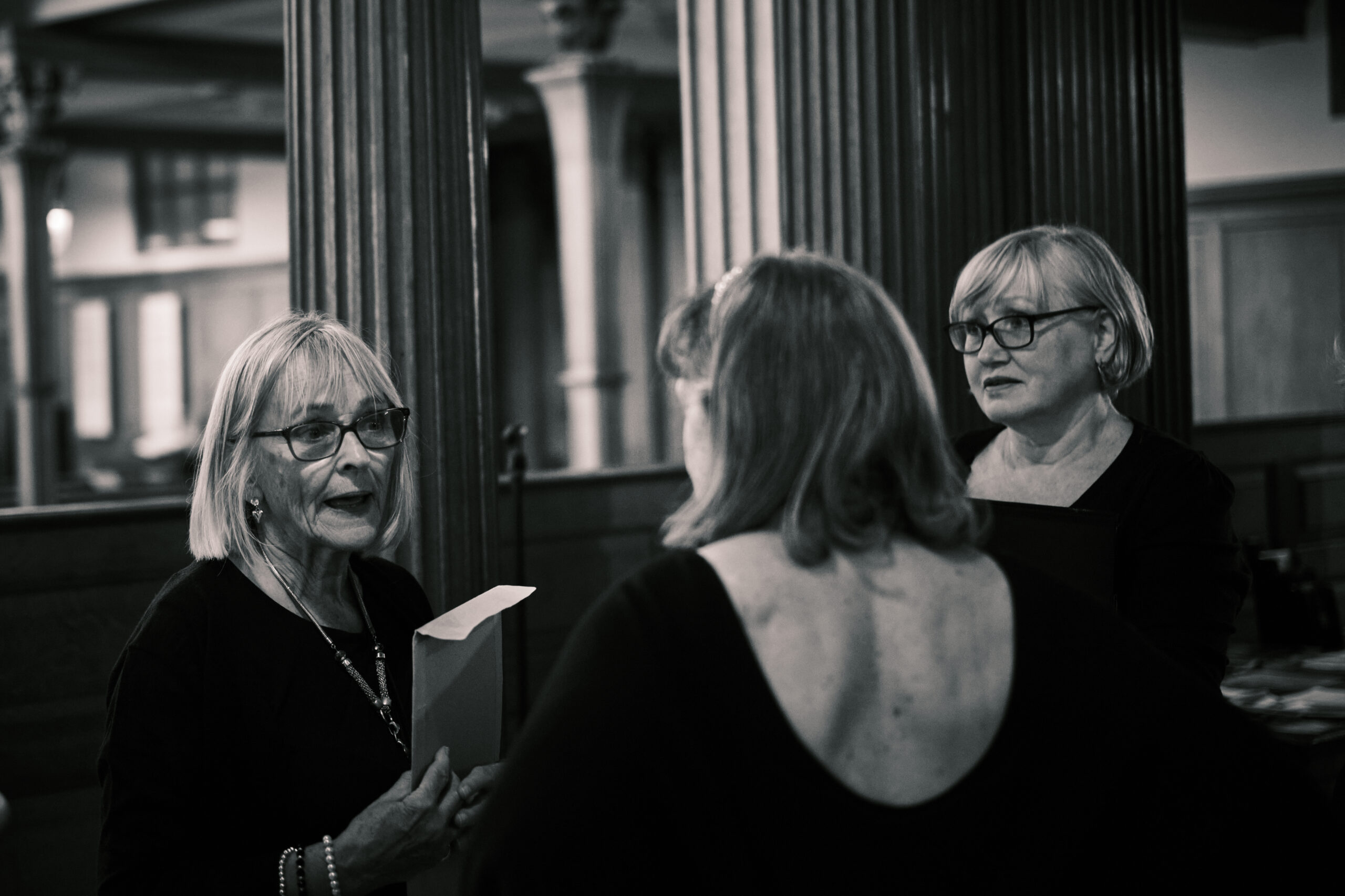 An image of ECS members Sue, Gill and Carole having a conversation pre-concert